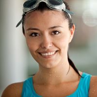 Photo of a woman with swim goggles
